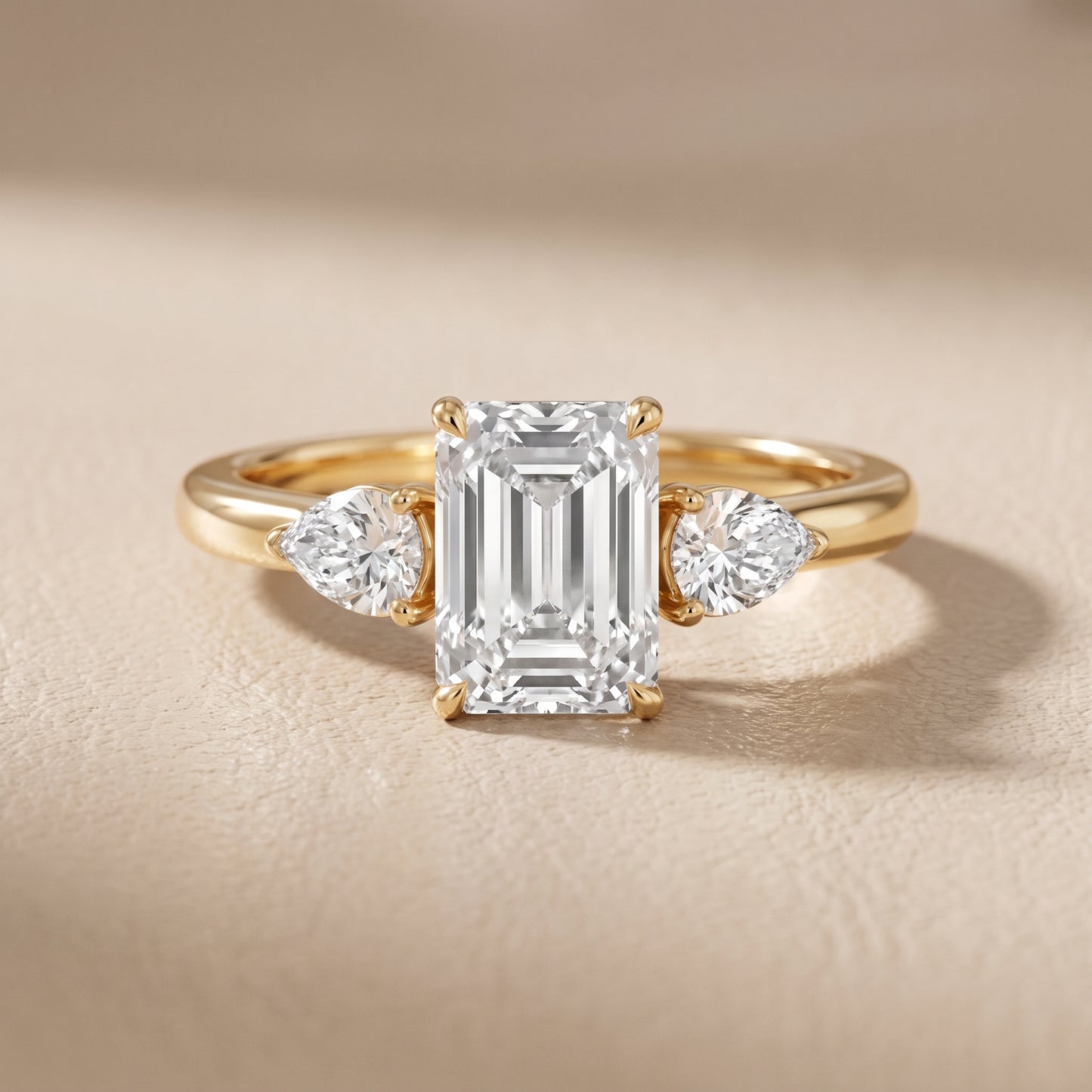 Phoebe Three-Stone Emerald Diamond Ring in Yellow Gold - front.jpg