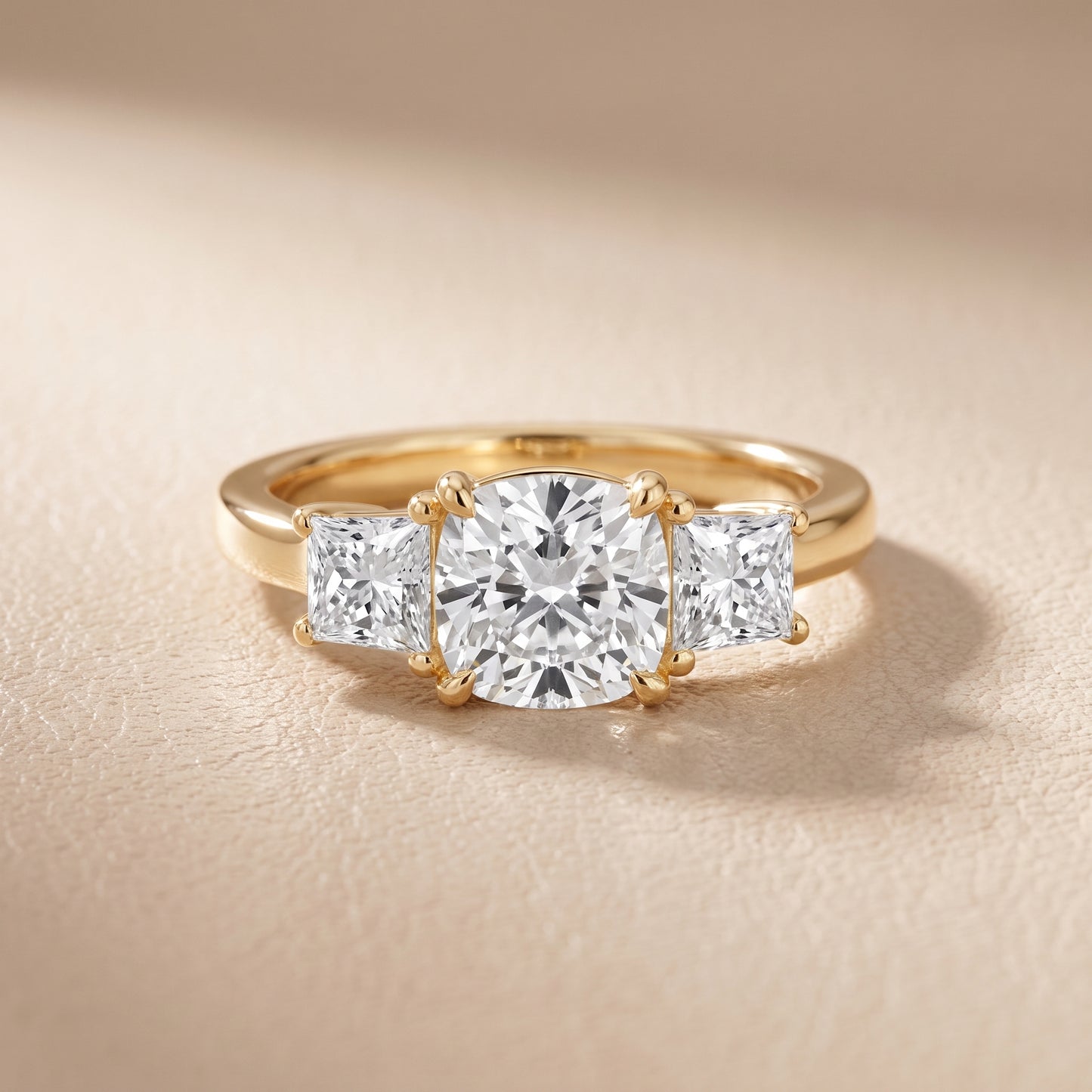 Sienna Three-Stone Cushion Diamond Ring in Yellow Gold - front.jpg