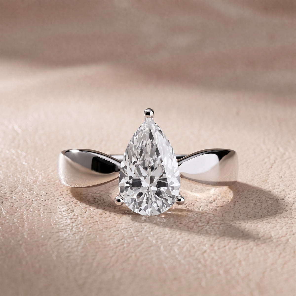 Talia Solitaire Twist Pear Diamond Engagement Ring in White Gold - front.jpg