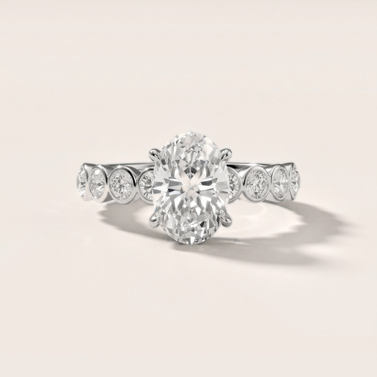 Edie Beaded Bezel Oval Diamond Engagement Ring in Platinum - front.jpg