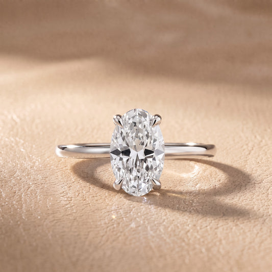 Nella Petite Solitaire Oval Diamond Engagement Ring in White Gold - front.jpg