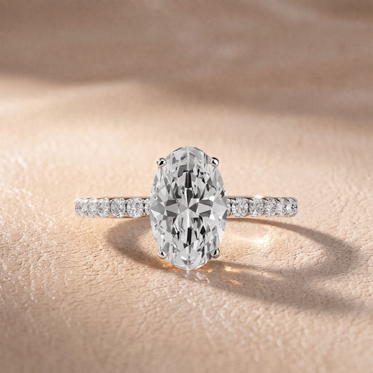 Juna French Pavé Solitaire Oval Diamond Engagement Ring in Platinum - front.jpg