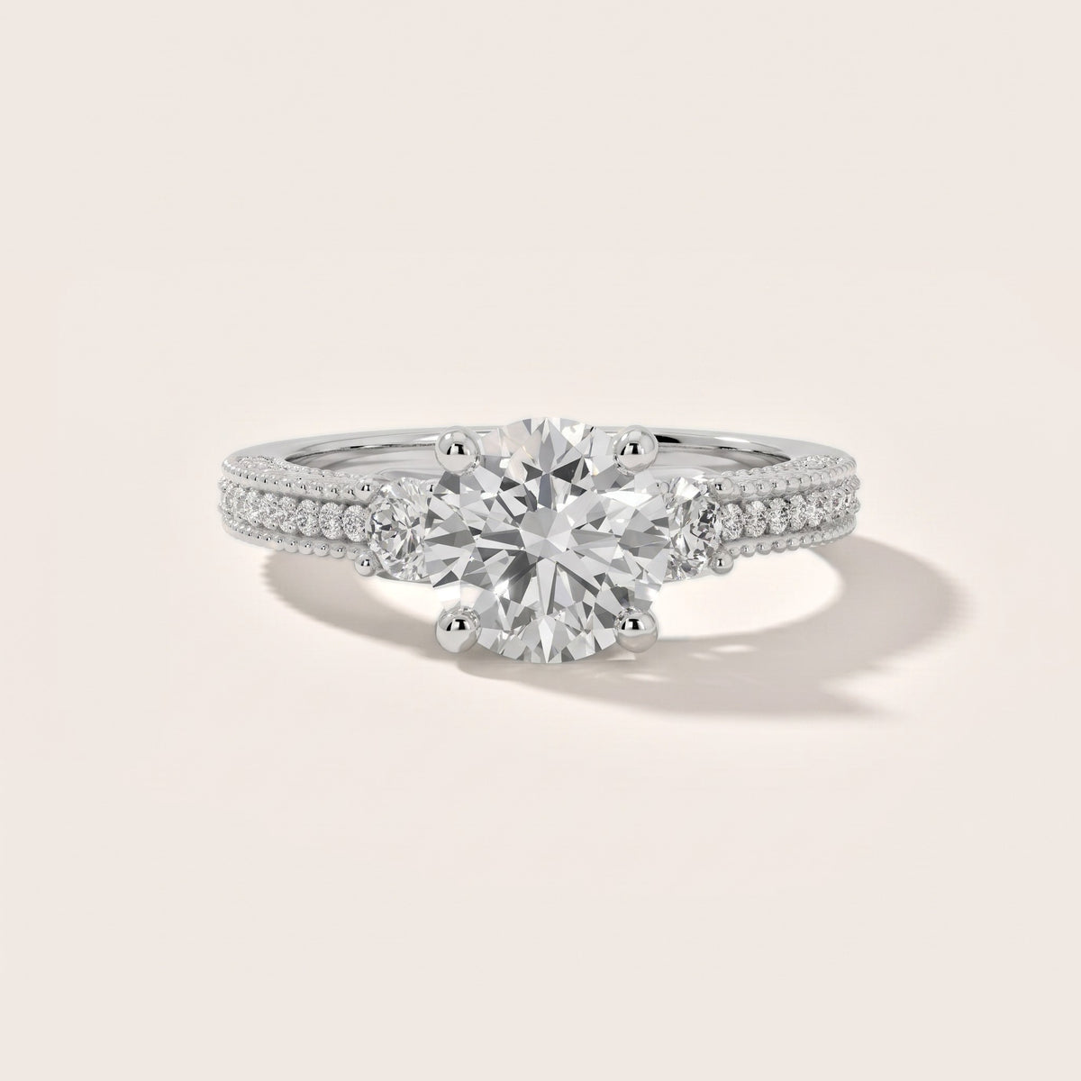 Mandy Milgrain Three-Stone Round Diamond Engagement Ring in Platinum - front.jpg