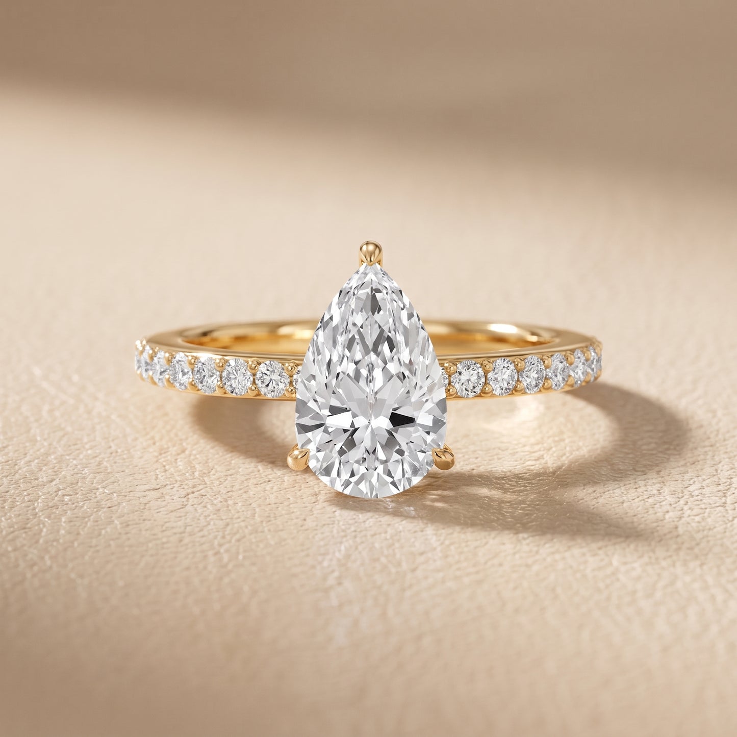 Aisha Pavé Solitaire Pear Diamond Engagement Ring in Yellow Gold - front.jpg