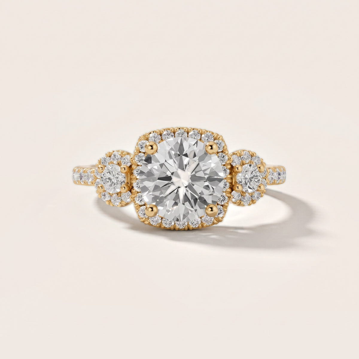 Denver Three-Stone Halo Round Diamond Engagement Ring in Yellow Gold - front.jpg