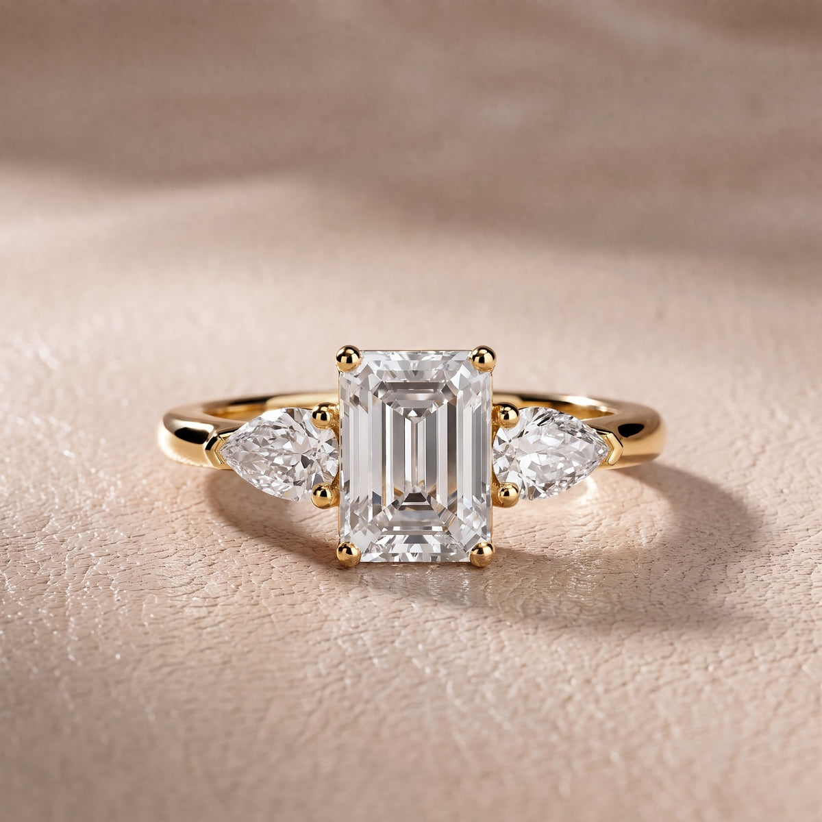 Sophia Three-Stone Emerald Diamond Engagement Ring in Yellow Gold - front.jpg