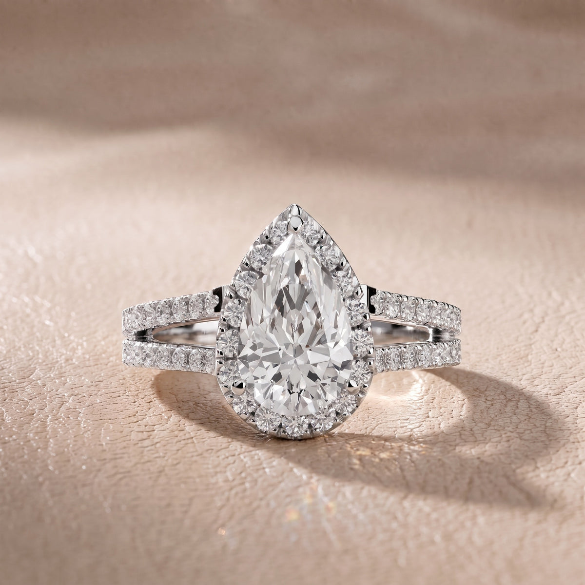 Kira Halo Split Shank Pear Diamond Engagement Ring in Platinum - front.jpg