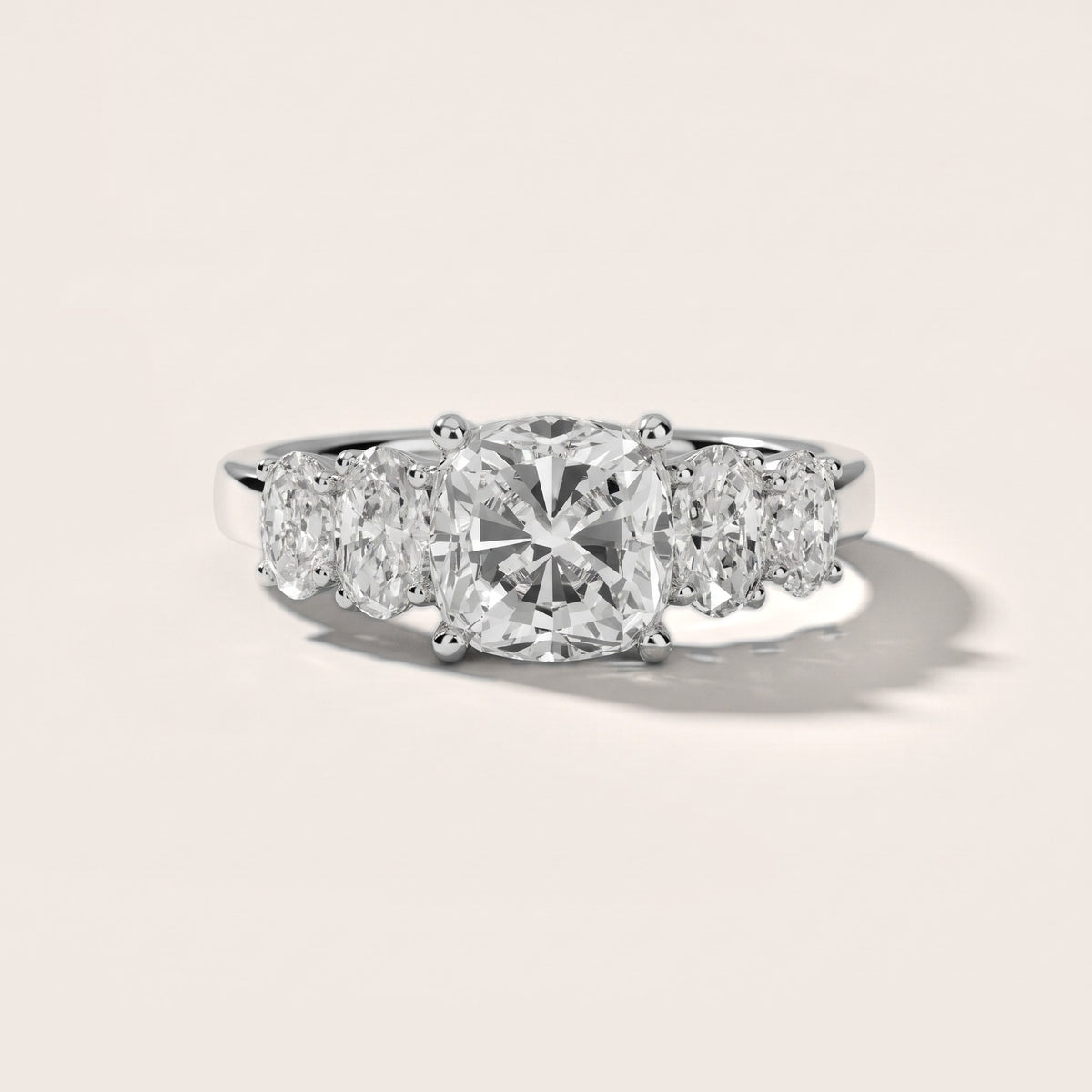 Kathy Graduated Five-Stone Cushion Diamond Engagement Ring in White Gold - front.jpg