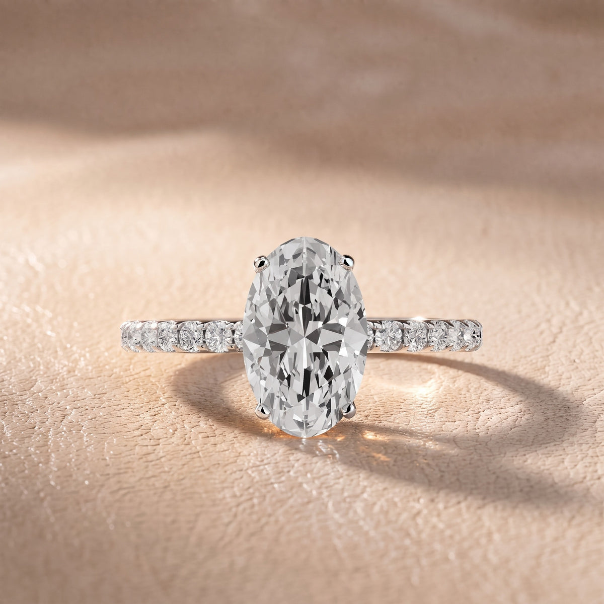 Juna French Pavé Solitaire Oval Diamond Engagement Ring in Silver - front.jpg