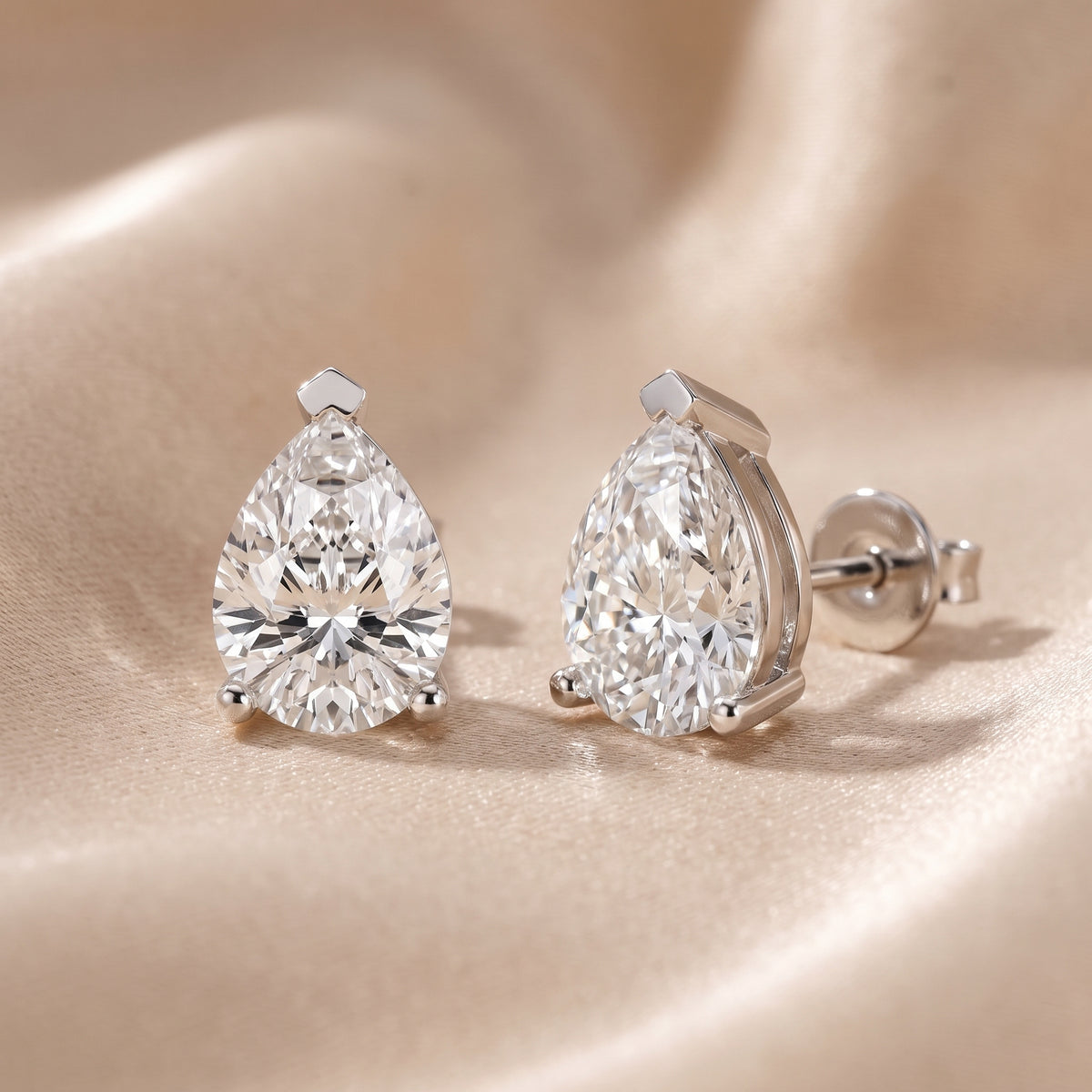 Four Prong Pear Diamond Stud Earrings in Silver - lifestyle
