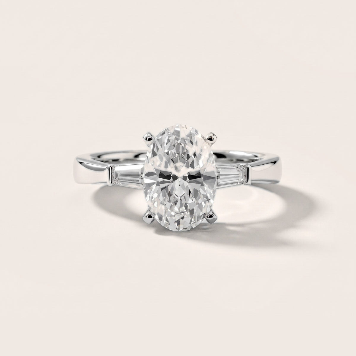 Jacinta Baguette Three-Stone Oval Diamond Engagement Ring in Silver - front.jpg