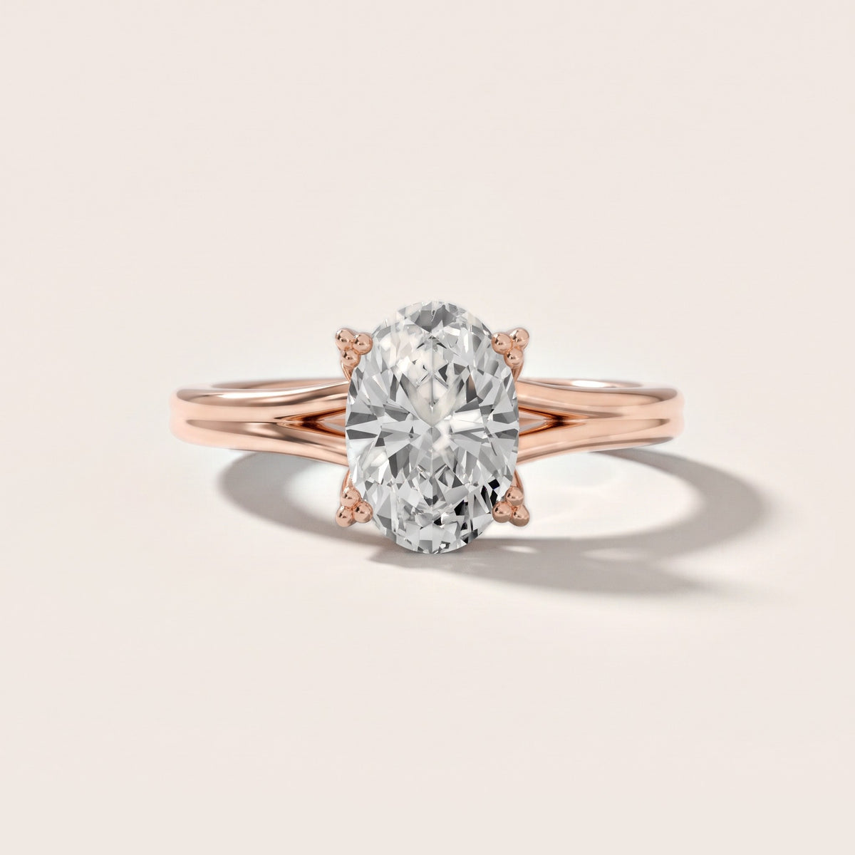 Neve Solitaire Split Shank Oval Diamond Engagement Ring in Rose Gold - front.jpg