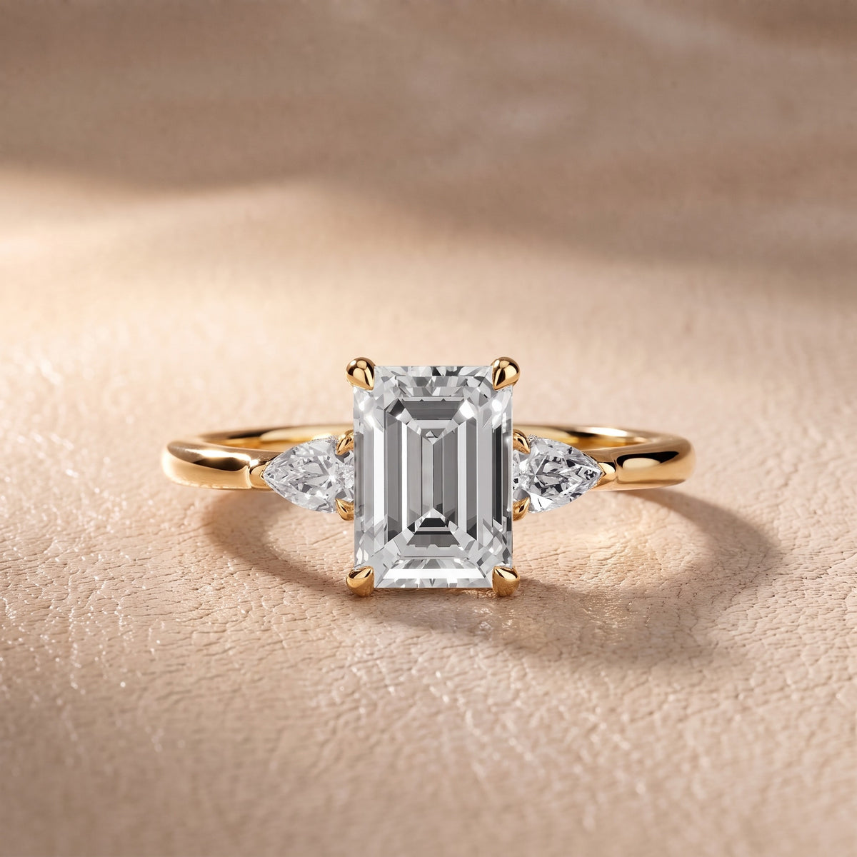 Leila Three-Stone Emerald Diamond Engagement Ring in Yellow Gold - front.jpg