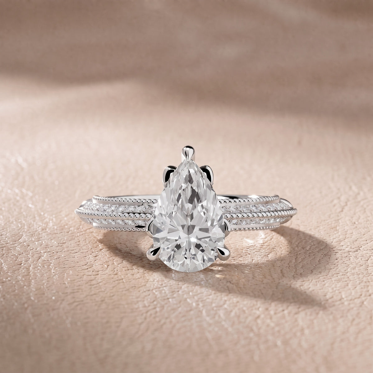 Chiara Vintage Milgrain Pear Diamond Engagement Ring in Platinum - front.jpg