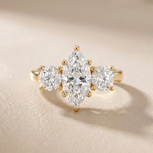Callie Three-Stone Trellis Marquise Diamond Engagement Ring in Yellow Gold - front.jpg