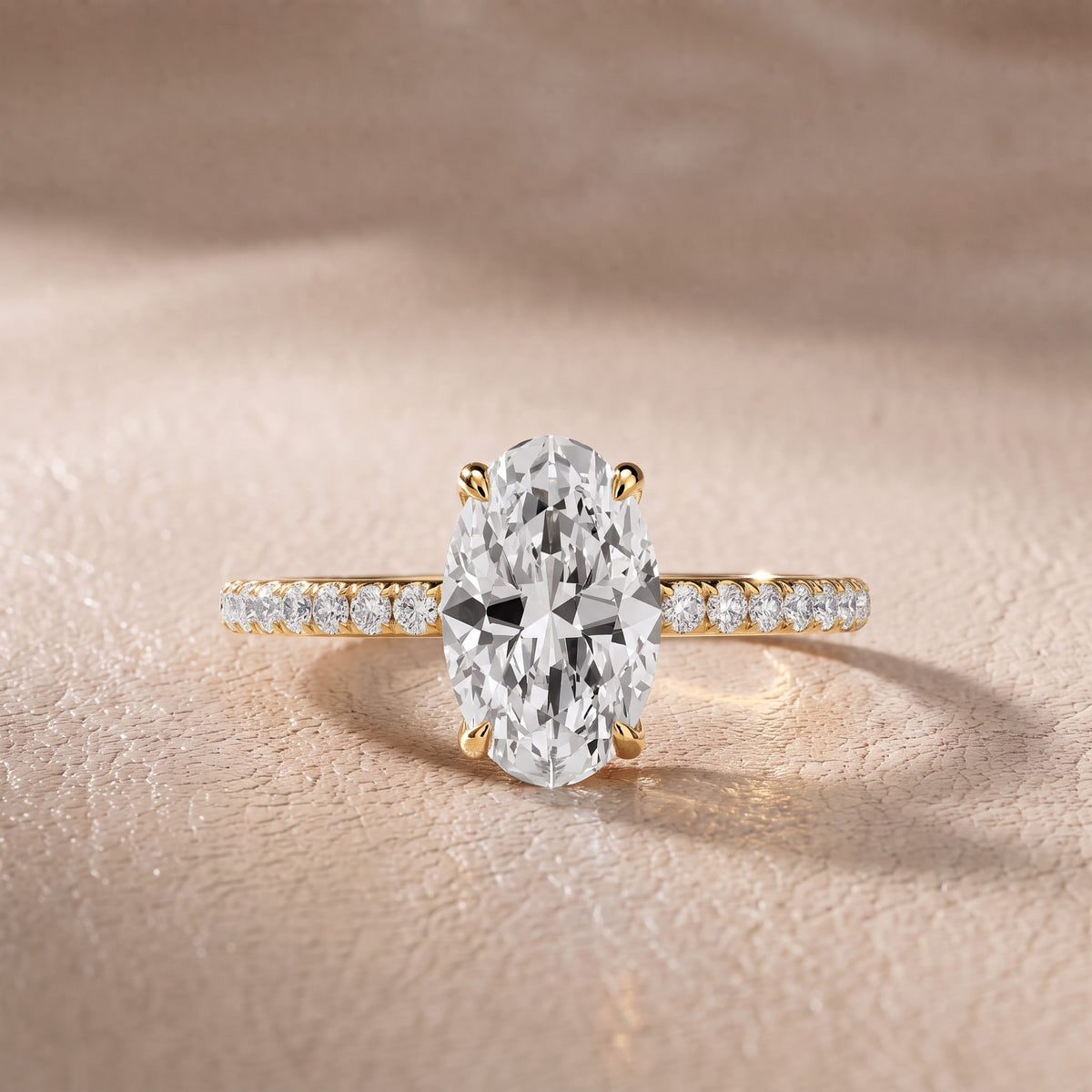 Olivia Solitaire Pavé Oval Diamond Engagement Ring in Yellow Gold - front.jpg