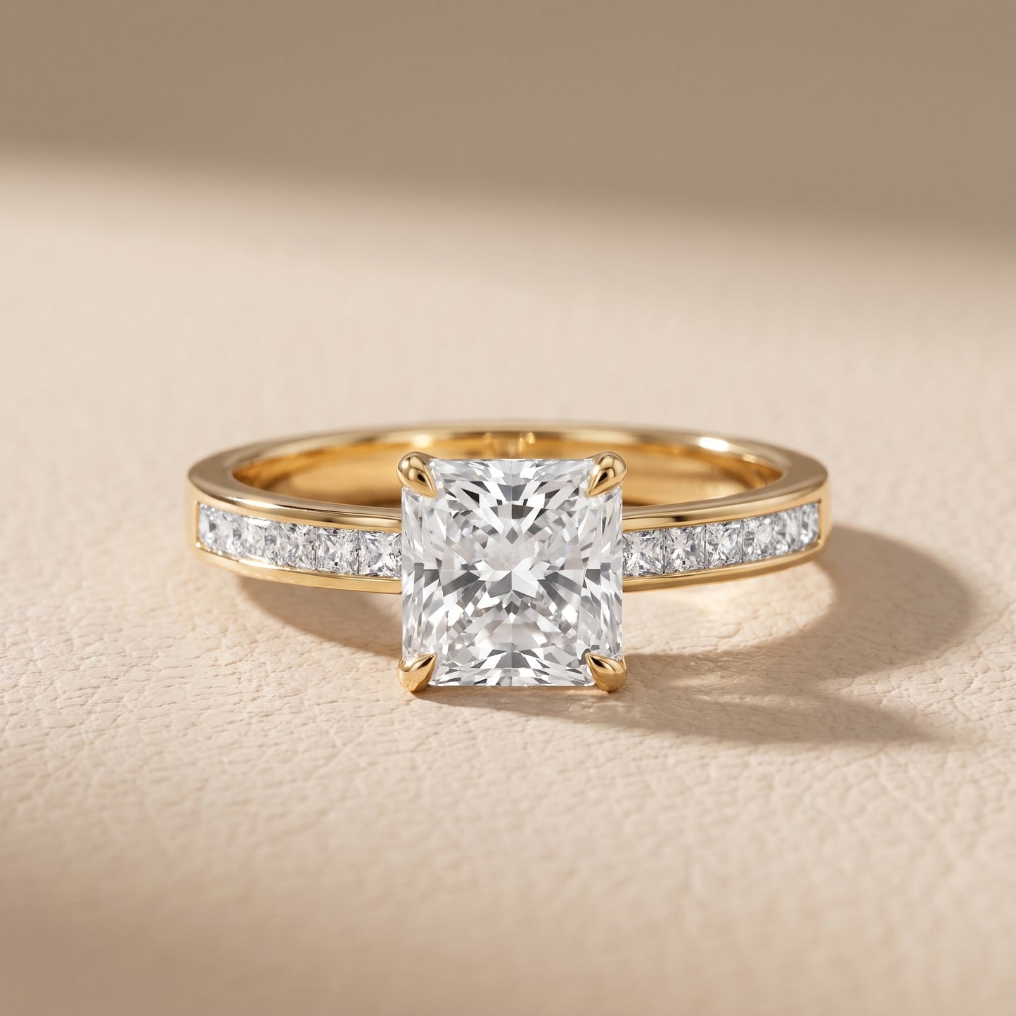 Maren Sidestone Channel Set Radiant Diamond Engagement Ring in Yellow Gold - front.jpg