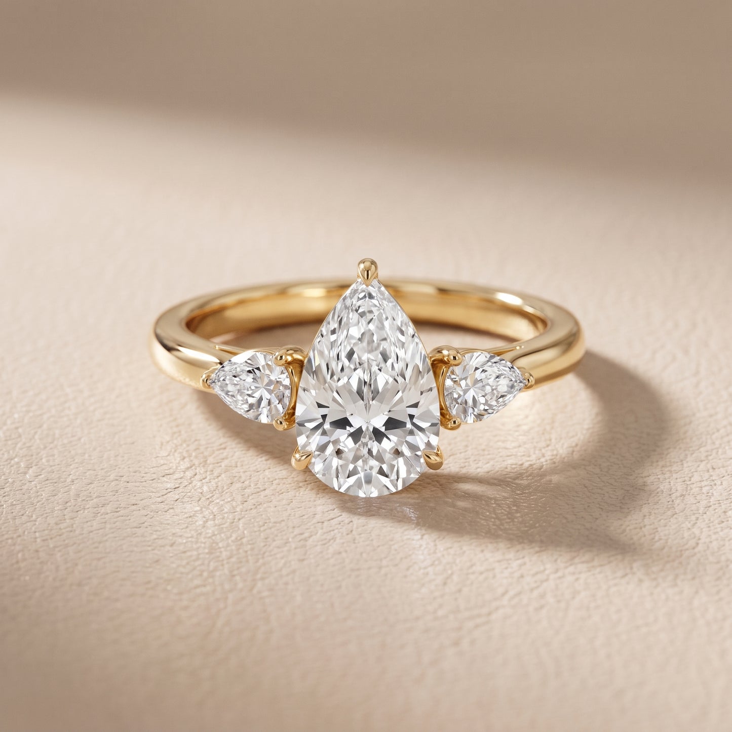 Phoebe Three-Stone Pear Diamond Ring in Yellow Gold - front.jpg