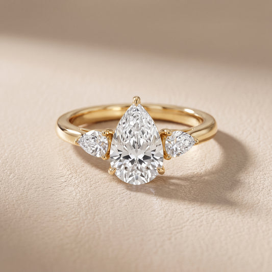 Phoebe Three-Stone Pear Diamond Ring in Yellow Gold - front.jpg