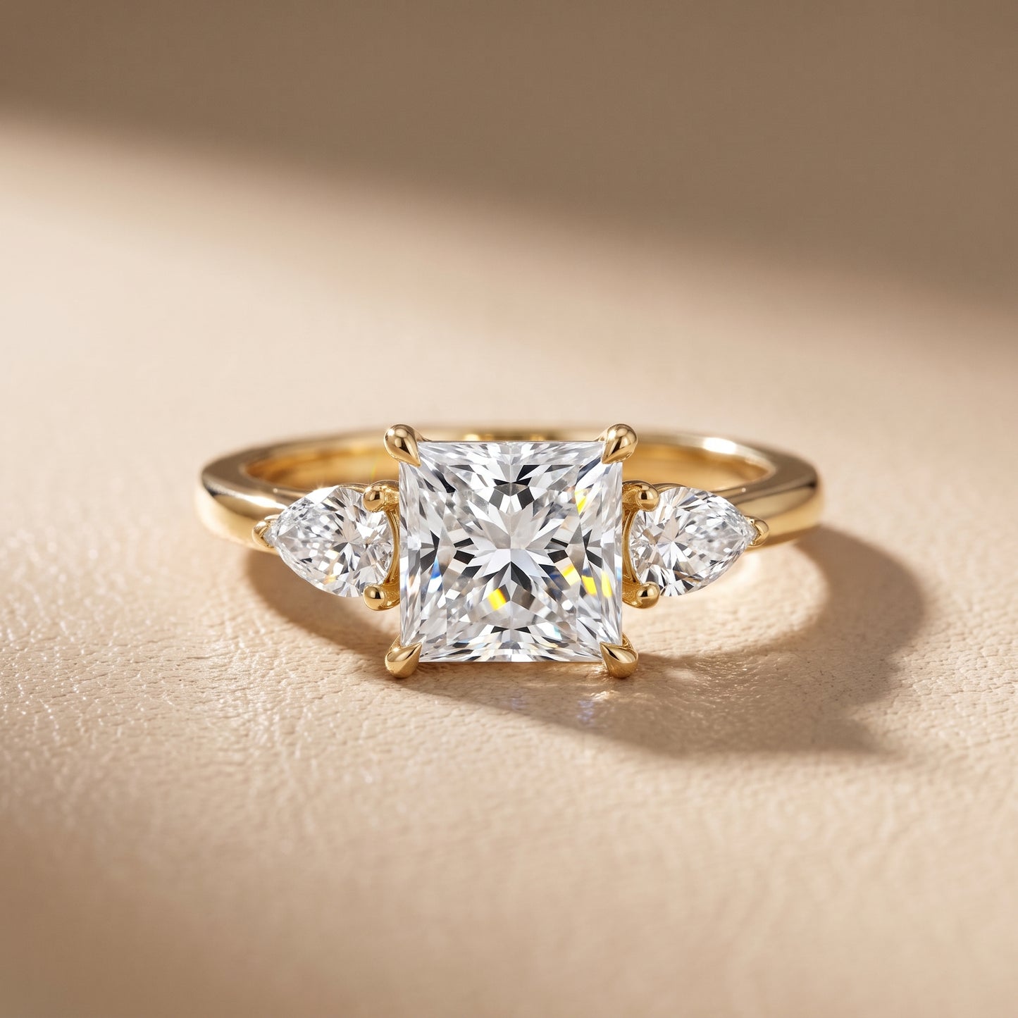 Phoebe Three-Stone Princess Diamond Ring in Yellow Gold - front.jpg