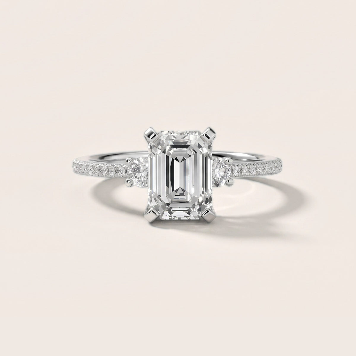 Nerissa Three-Stone Micropavé Emerald Diamond Engagement Ring in Silver - front.jpg