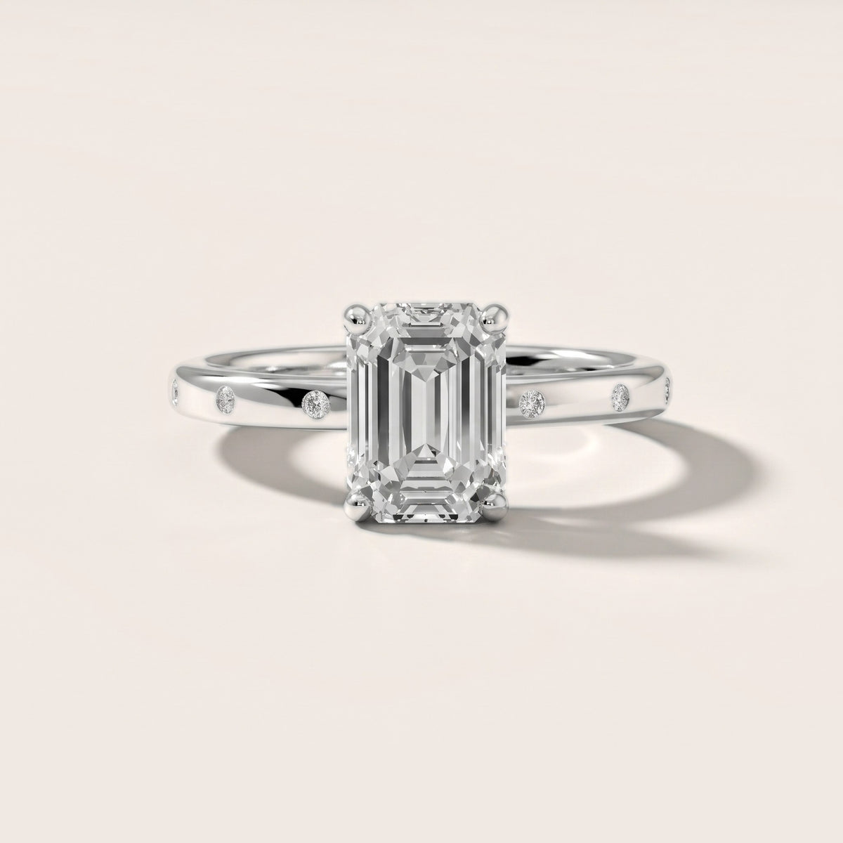 Dulcie Flush-Set Emerald Diamond Engagement Ring in White Gold - front.jpg