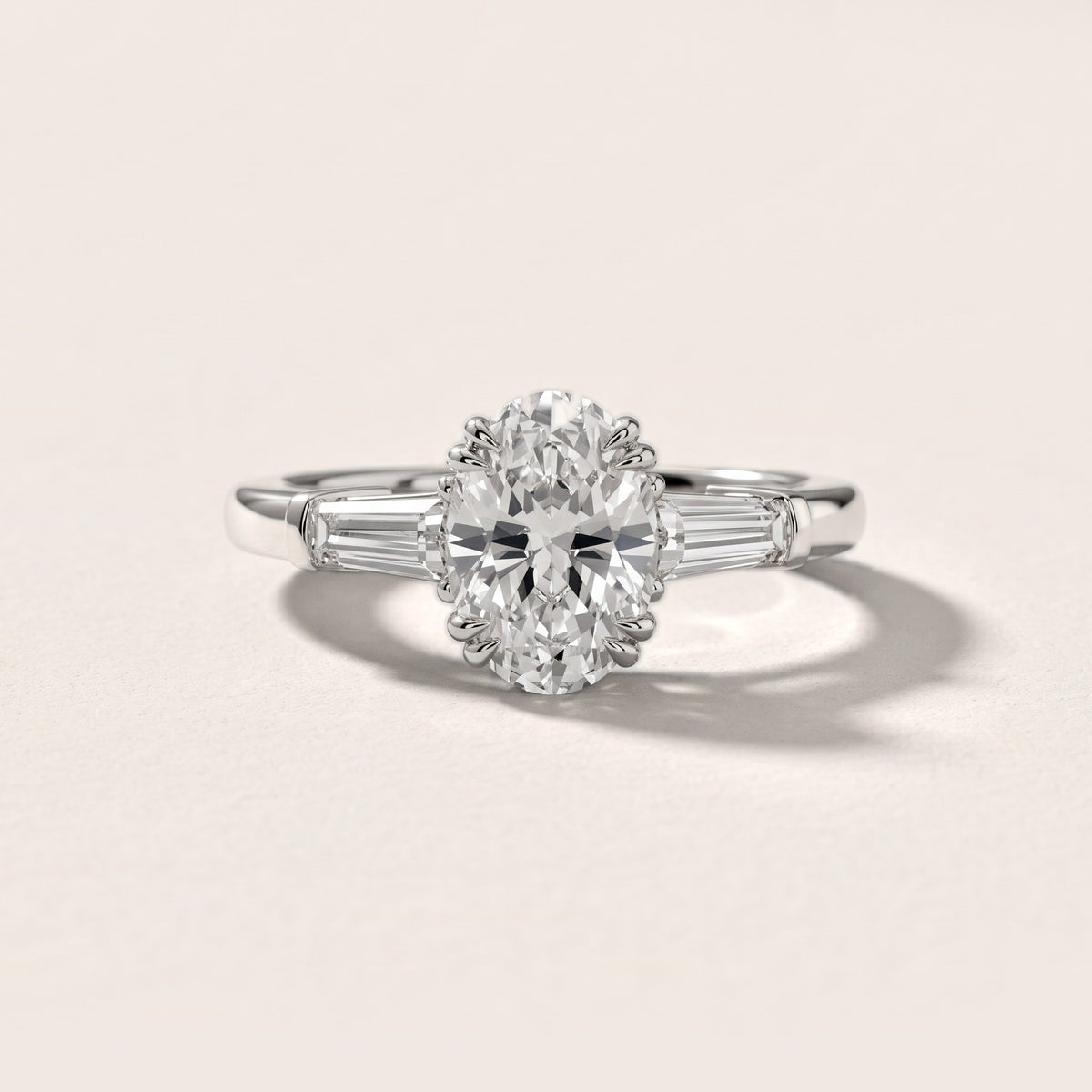 Betsy Baguette Three-Stone Oval Diamond Engagement Ring in Silver - front.jpg