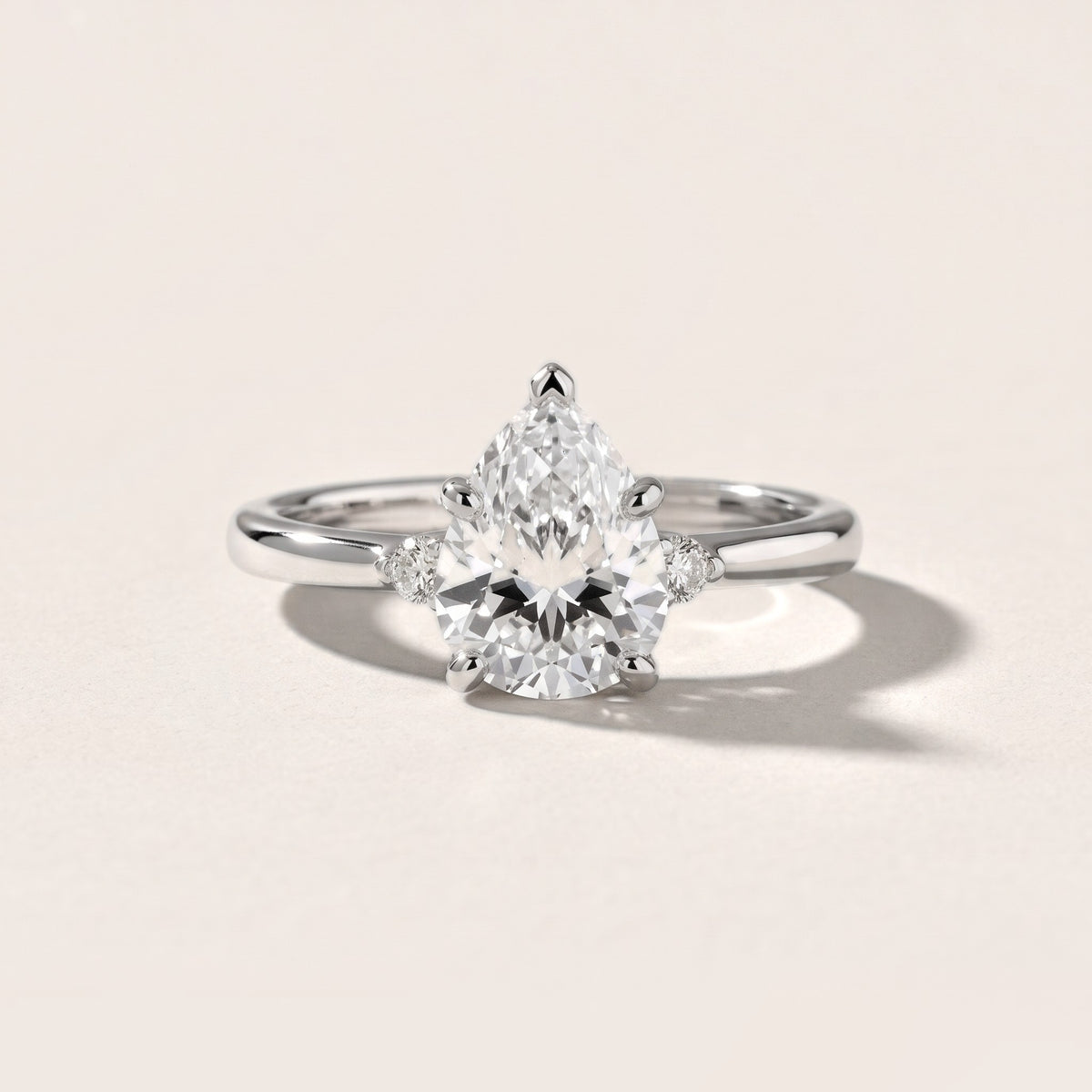 Teodora Floating Three-Stone Pear Diamond Engagement Ring in Silver - front.jpg