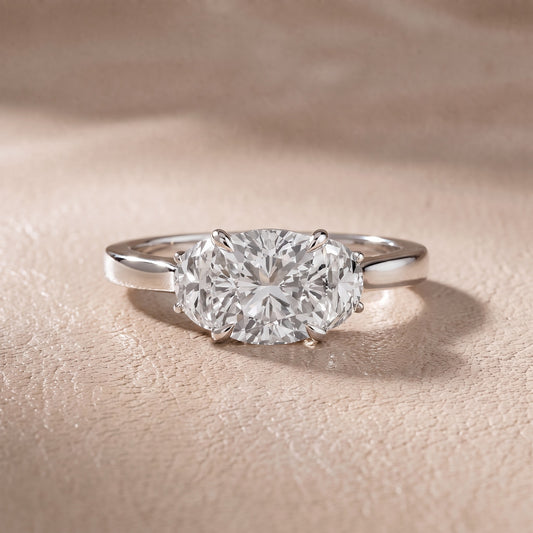 Romy Three-Stone Cushion Diamond Engagement Ring in White Gold - front.jpg