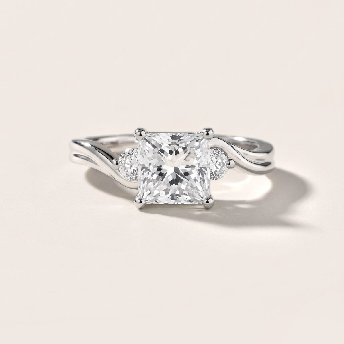 Rena Bypass Three-Stone Princess Diamond Engagement Ring in Platinum - front.jpg