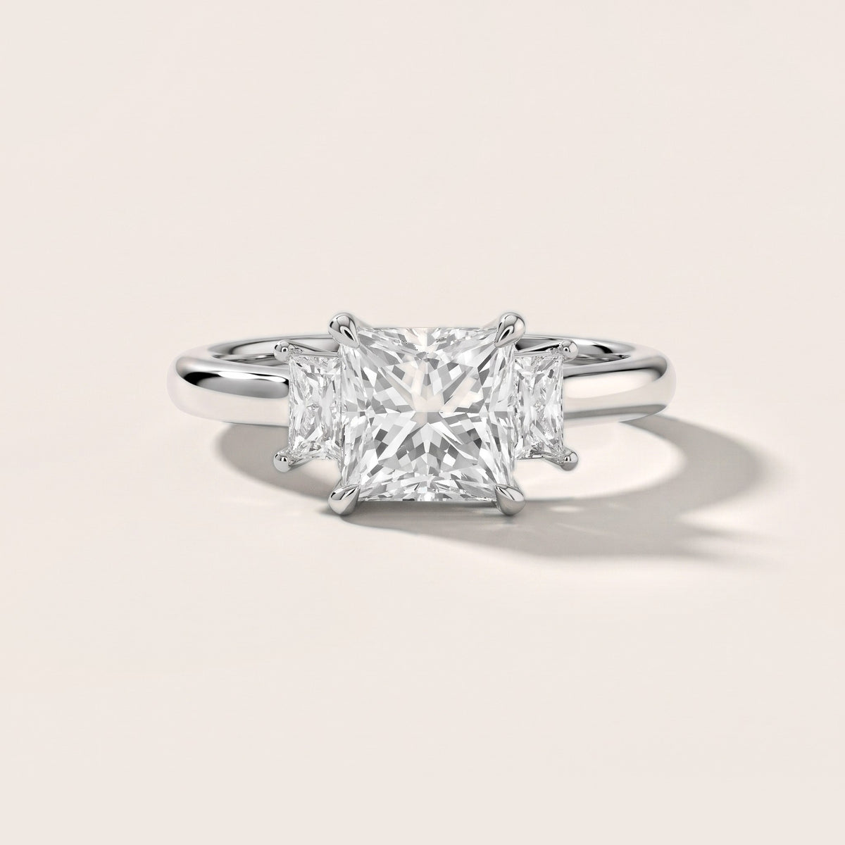 Cosette Statement Three-Stone Princess Diamond Engagement Ring in Silver - front.jpg
