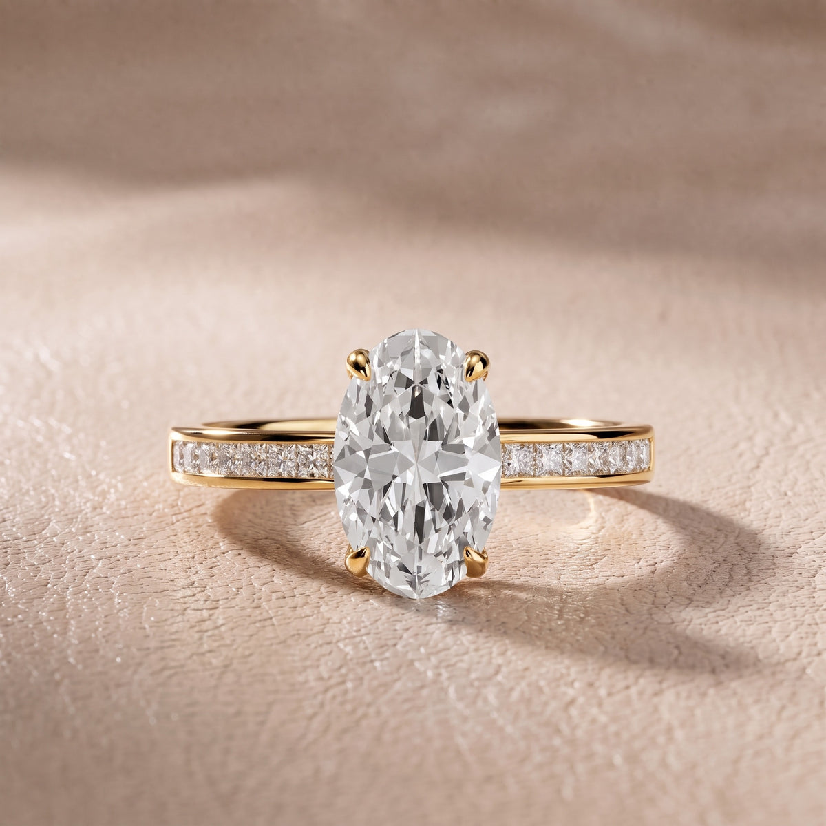 Maren Sidestone Channel Set Oval Diamond Engagement Ring in Yellow Gold - front.jpg