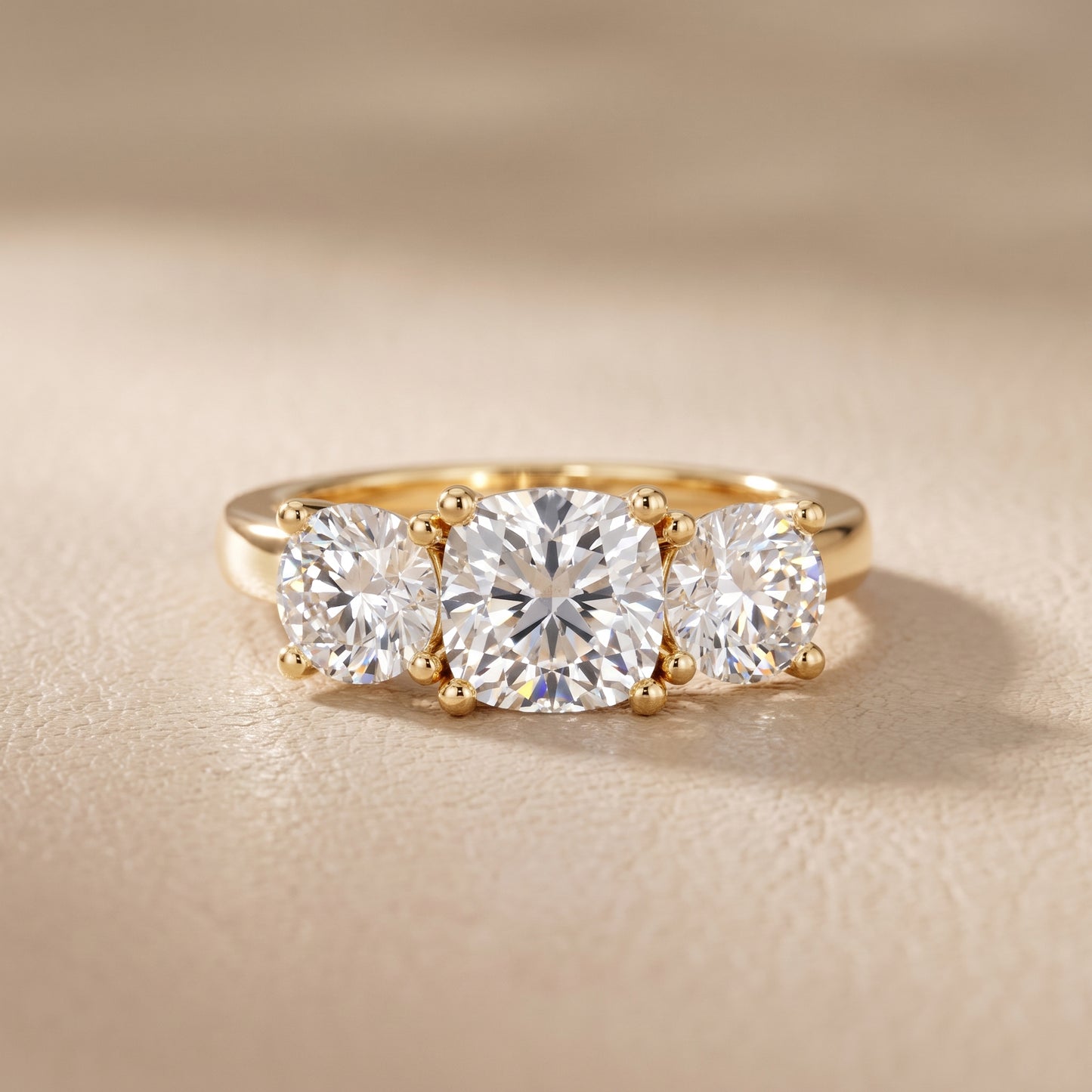 Callie Three-Stone Trellis Cushion Diamond Ring in Yellow Gold - front.jpg
