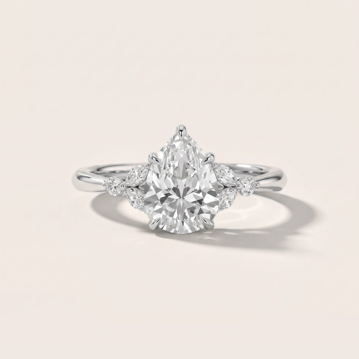 Eve Leaf Cluster Pear Diamond Engagement Ring in Platinum - front.jpg