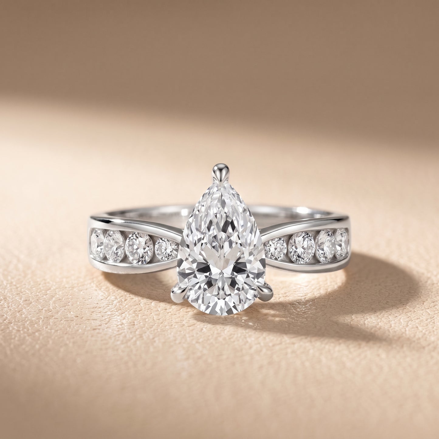 Noor Channel Set Sidestone Pear Diamond Engagement Ring in Silver - front.jpg
