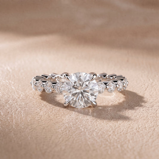 Piper Sidestone Round Diamond Engagement Ring in Platinum - front.jpg