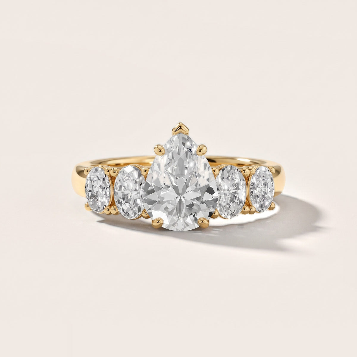 Judith Statement Five-Stone Pear Diamond Engagement Ring in Yellow Gold - front.jpg