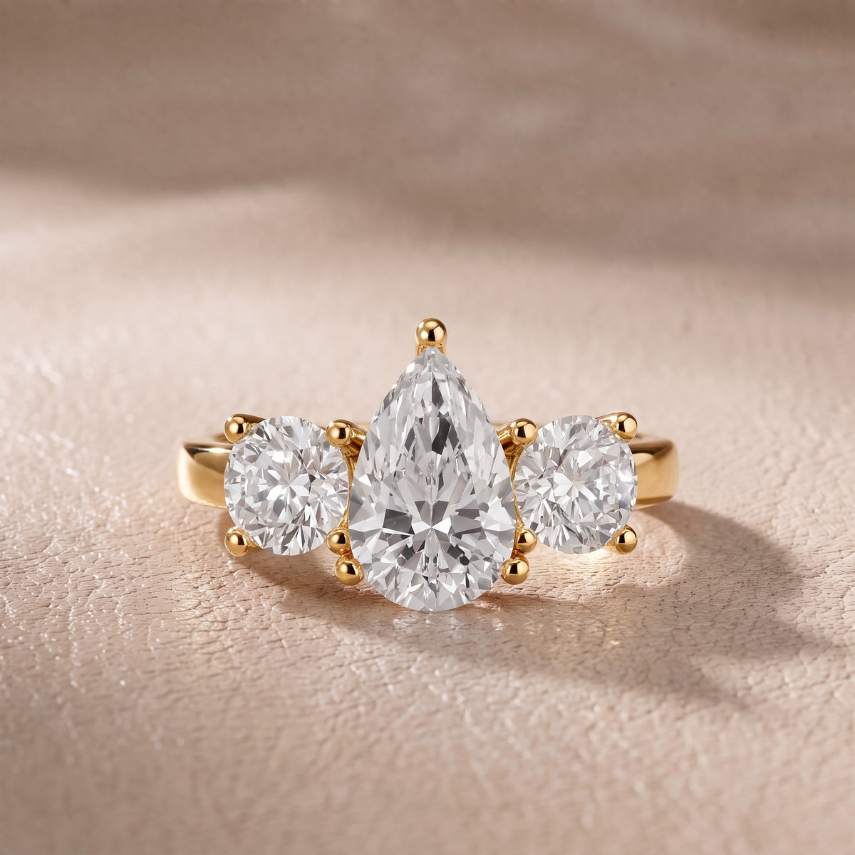 Callie Three-Stone Trellis Pear Diamond Engagement Ring in Yellow Gold - front.jpg