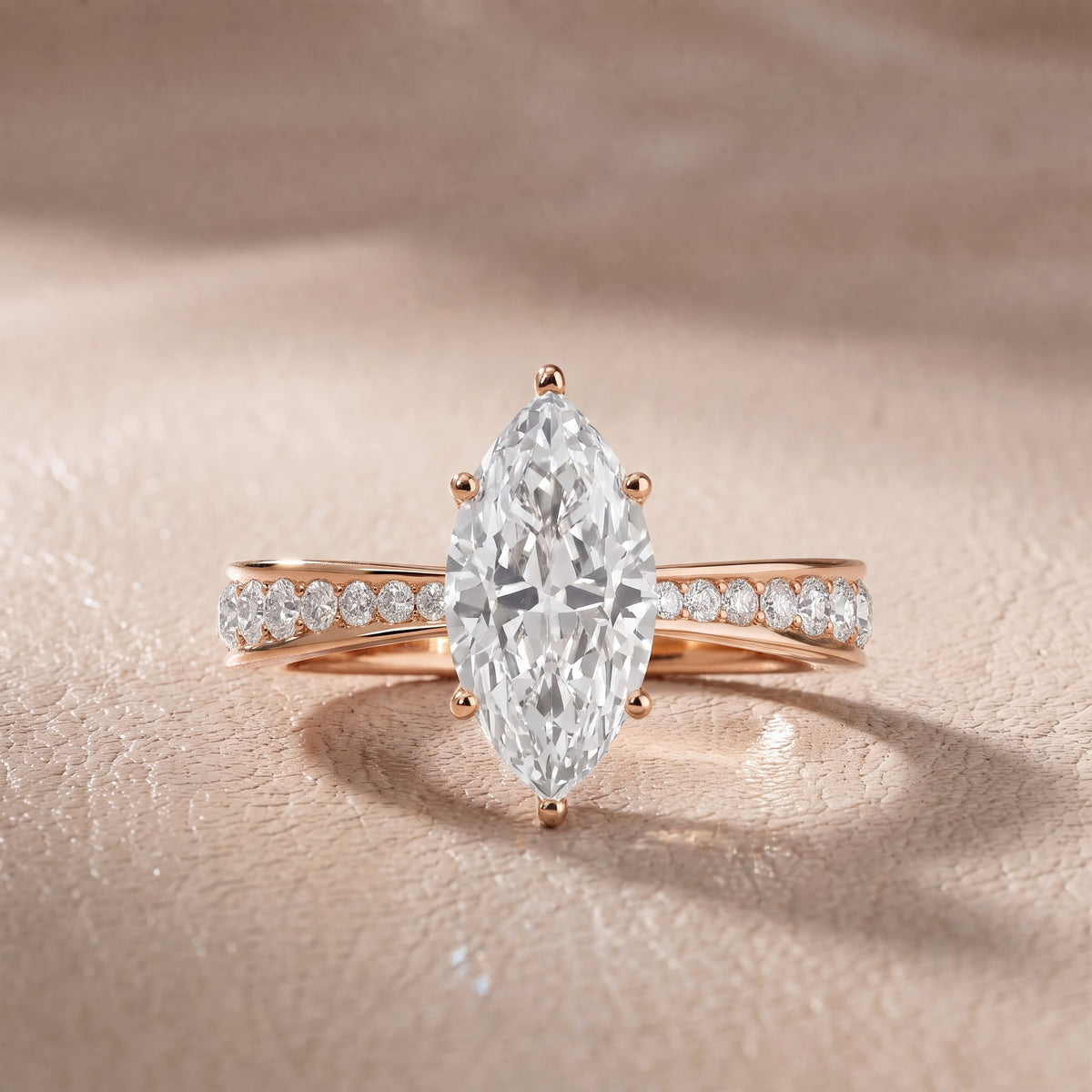 Rhea Sidestone Pavé Marquise Diamond Engagement Ring in Rose Gold - front.jpg