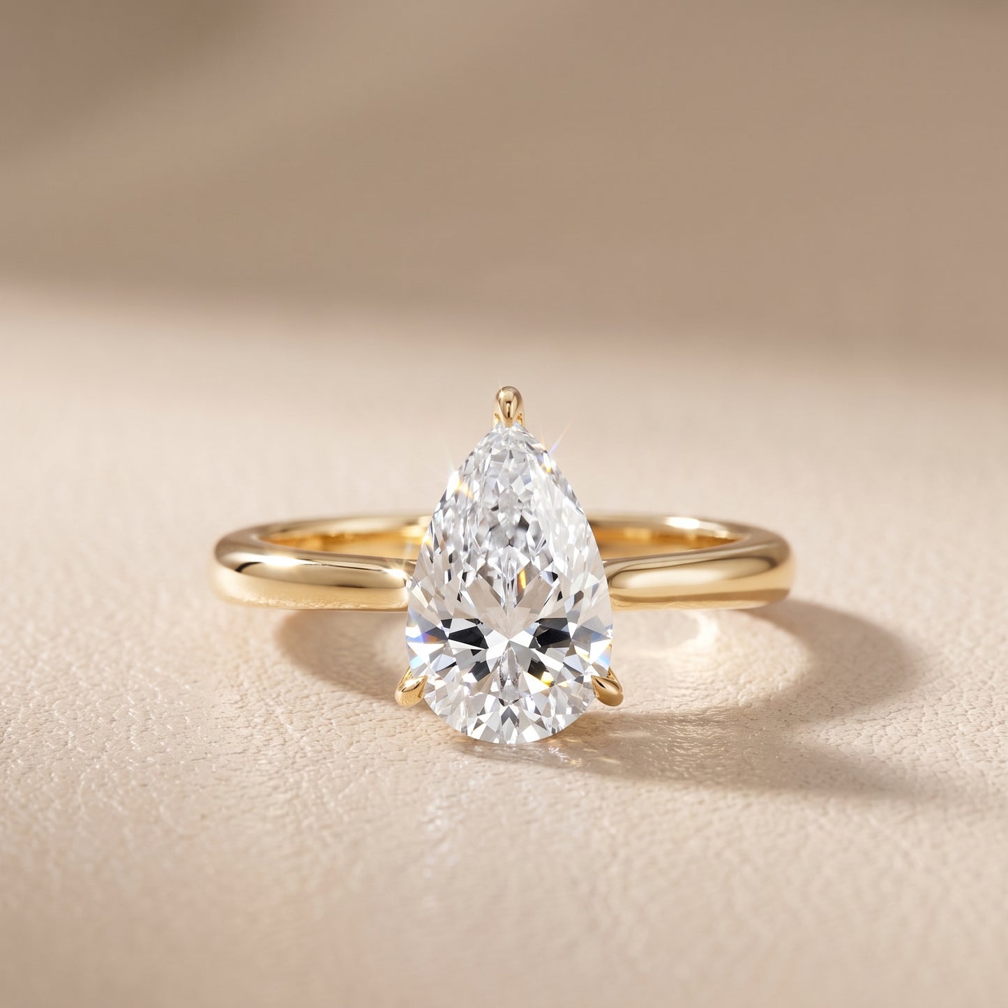 Evie Solitaire Six-Prong Pear Diamond Engagement Ring in Yellow Gold - front.jpg
