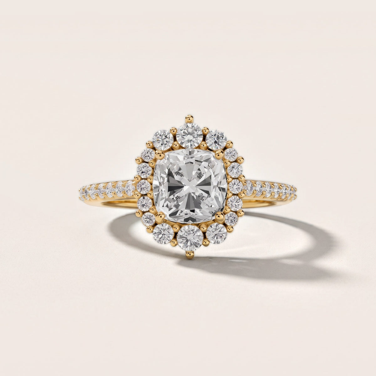 Rowena Graduated Halo Cushion Diamond Engagement Ring in Yellow Gold - front.jpg
