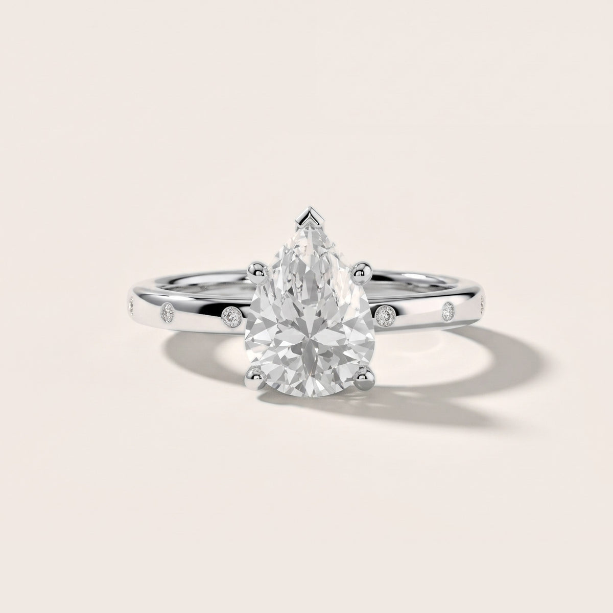 Dulcie Flush-Set Pear Diamond Engagement Ring in Silver - front.jpg