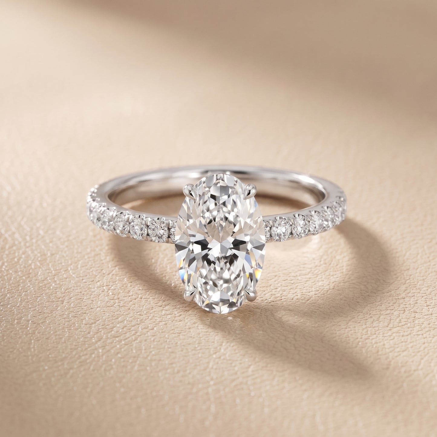 Juna French Pavé Solitaire Oval Diamond Engagement Ring in Platinum - front.jpg