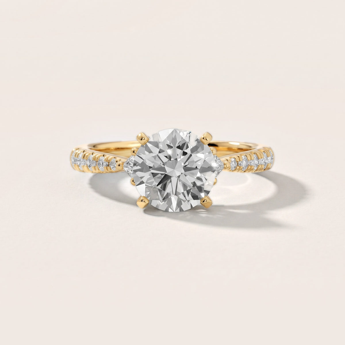 Alethea Three-Stone Pavé Round Diamond Engagement Ring in Yellow Gold - front.jpg