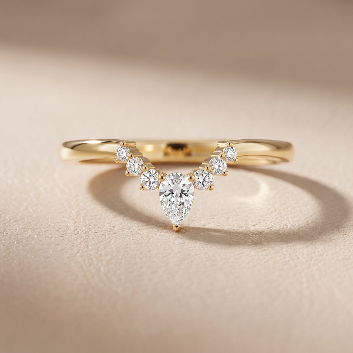 Nisha Curved Pear & Round Diamond Wedding Band in Yellow Gold - front.jpg