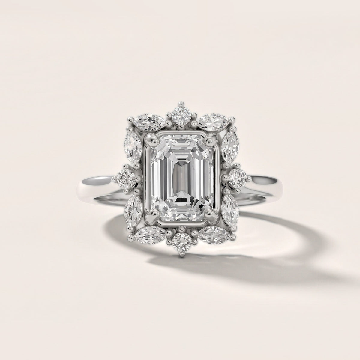 Brynn Starburst Cluster Emerald Diamond Engagement Ring in White Gold - front.jpg