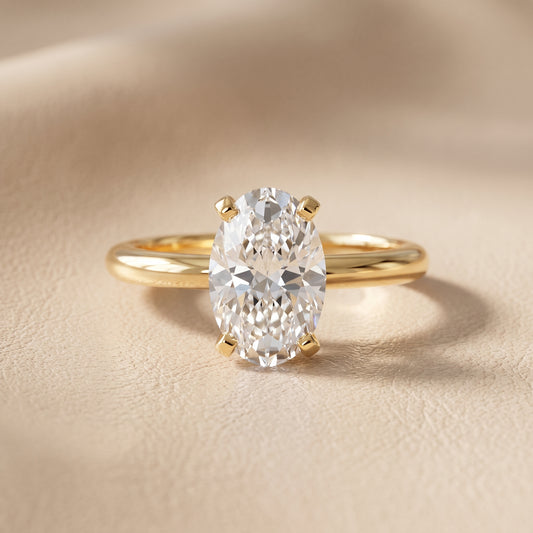 Amira Six-Prong Solitaire Oval Diamond Engagement Ring in Yellow Gold - front.jpg