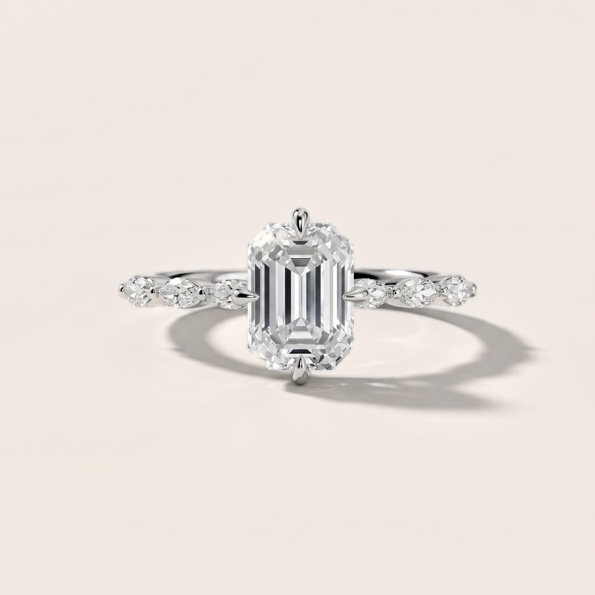 April Marquise-Side Emerald Diamond Engagement Ring in Platinum - front.jpg