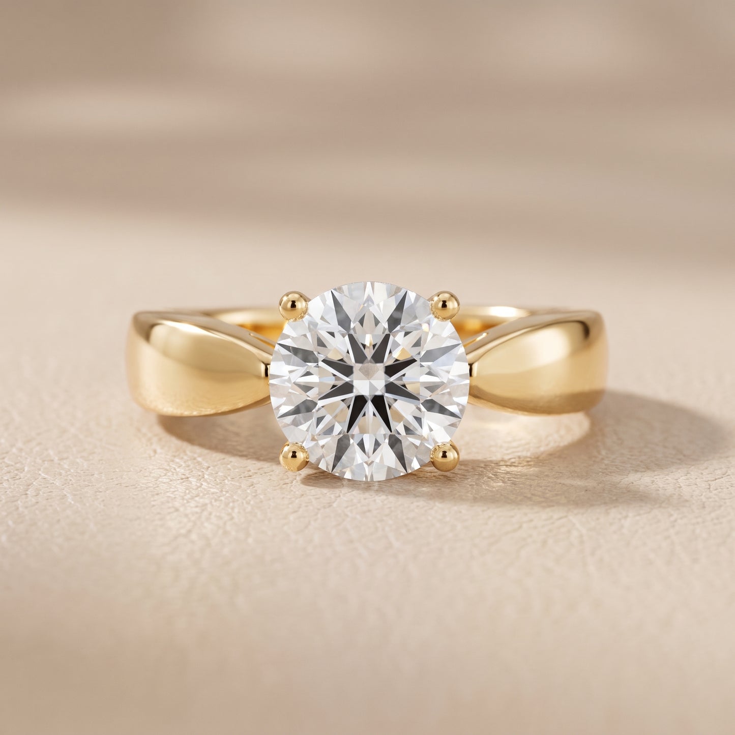 Talia Solitaire Twist Round Diamond Engagement Ring in Yellow Gold - front.jpg