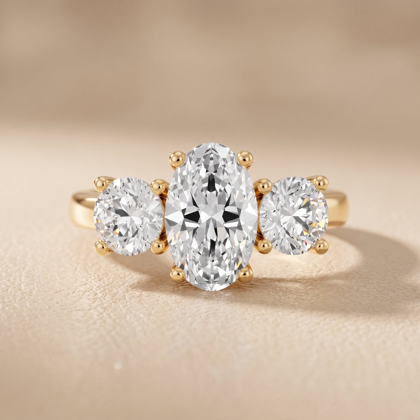 Callie Three-Stone Trellis Oval Diamond Engagement Ring in Yellow Gold - front.jpg
